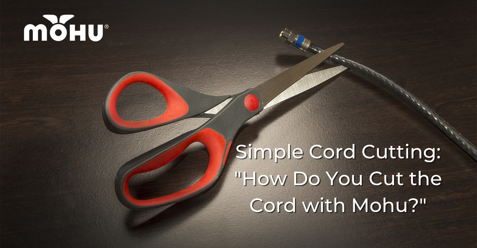 Scissors on a table cutting a coax cable, Simple Cord Cutting How Do You Cut the Cord with Mohu