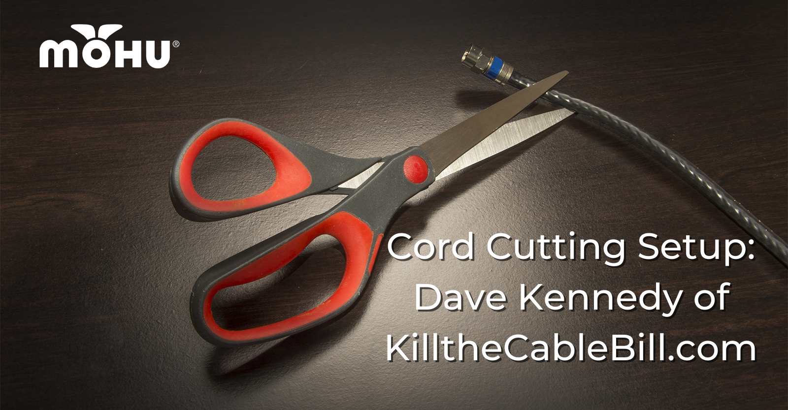 Scissors on dark background and table cutting a coaxial cable, Cord Cutting Setup Dave Kennedy of KilltheCableBill.com