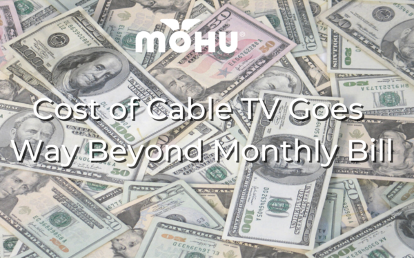 Pile of money on a table with the copy Cost of Cable TV Goes Way Beyond Monthly Bill and the Mohu logo