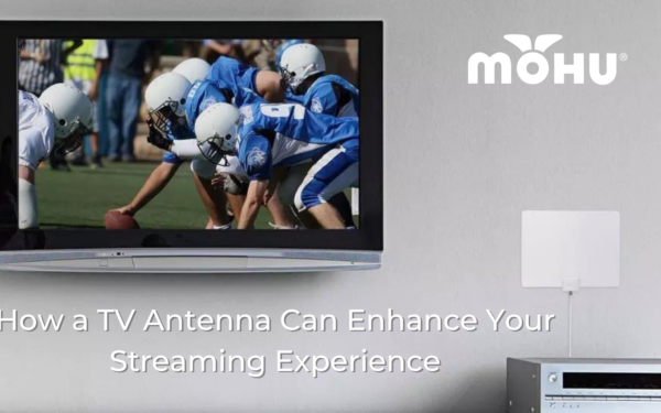 How a Mohu TV Antenna Can Enhance Your Streaming Experience, Mohu antenna on wall with flat screen TV with football playing